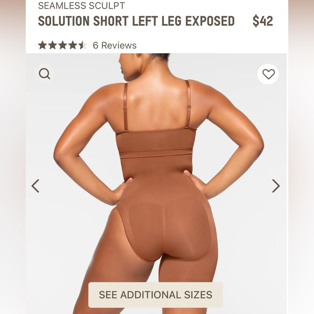 Skims shapewear shorts (left leg exposed)